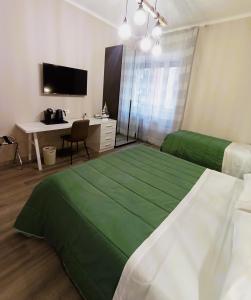 Postel nebo postele na pokoji v ubytování BariVera rooms
