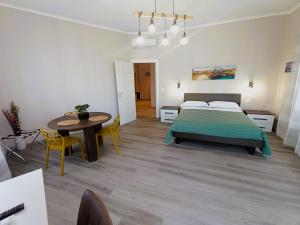 Postel nebo postele na pokoji v ubytování BariVera rooms