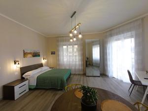 Postel nebo postele na pokoji v ubytování BariVera rooms