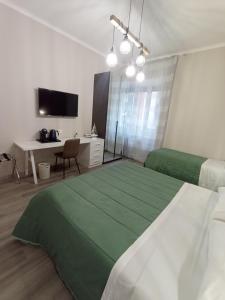 Postel nebo postele na pokoji v ubytování BariVera rooms