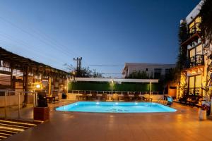 a swimming pool in the middle of a building at west coast boutique hotel in Bodrum City