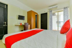 Ένα ή περισσότερα κρεβάτια σε δωμάτιο στο Hotel Tyche Stays