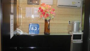 O bucătărie sau chicinetă la Philippine Hostel