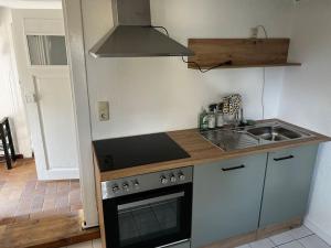 Η κουζίνα ή μικρή κουζίνα στο Cottage mit Garten