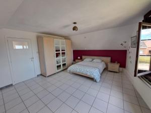 Postel nebo postele na pokoji v ubytování Vakantiewoning Sint-Jan