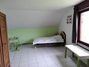Postel nebo postele na pokoji v ubytování Vakantiewoning Sint-Jan