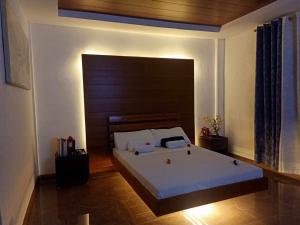 Ліжко або ліжка в номері GBU Loboc River Guesthouse
