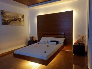 Ліжко або ліжка в номері GBU Loboc River Guesthouse