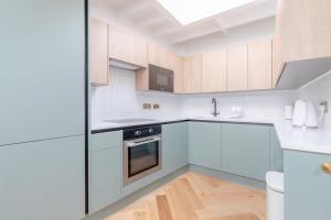 Nhà bếp/bếp nhỏ tại Luxuriously Compact 1BD Eco Home Clapham Common!