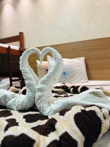 Ein Bett oder Betten in einem Zimmer der Unterkunft Pousada Ilha Bela