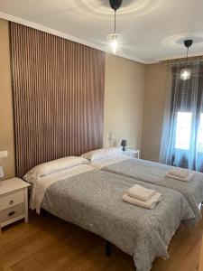 Posteľ alebo postele v izbe v ubytovaní Sumergete en leon I y II vivienda turística
