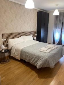 Posteľ alebo postele v izbe v ubytovaní Sumergete en leon I y II vivienda turística