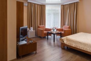 Кровать или кровати в номере Residence Odesskij Dvorik +79 фотографий