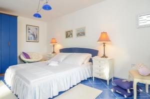 Säng eller sängar i ett rum på Ferienwohnung für 2 Personen ca 50 qm in Orebić, Dalmatien Süddalmatien