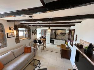 a living room with a couch and a table at Apartment Massimo in Rijeka
