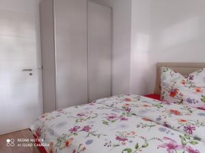Ένα ή περισσότερα κρεβάτια σε δωμάτιο στο Ferienwohnung Mönchgut +5 φωτογραφίες