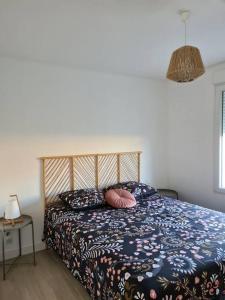 Ένα ή περισσότερα κρεβάτια σε δωμάτιο στο Maison récente, climatisée (8 pers.) +8 φωτογραφίες