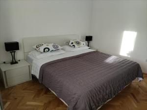 Postel nebo postele na pokoji v ubytování Apartments Podbarje