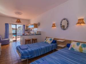 Ένα ή περισσότερα κρεβάτια σε δωμάτιο στο Casa Margarita