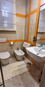 Koupelna v ubytování Zigante Rooms