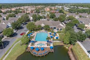 an aerial view of a resort with a swimming pool at Mickey's Magical Townhome Venetian Bay Villages in Kissimmee