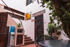an outside view of a building with a vending machine at Hotel Don Nino in Oaxaca City