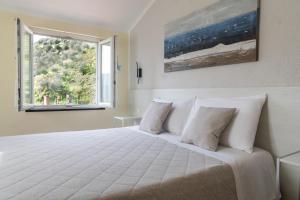 Postel nebo postele na pokoji v ubytování B&B Vignola