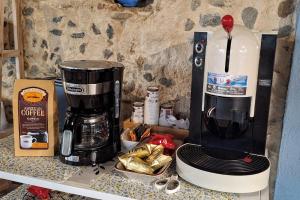 a coffee maker sitting on top of a counter at Residenza Mistral in Rende