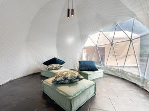 a room with three couches in a tent at ＳＰＲＩＮＧＳ ＶＩＬＬＡＧＥ - Vacation STAY 67333v in Oyama +10 photos