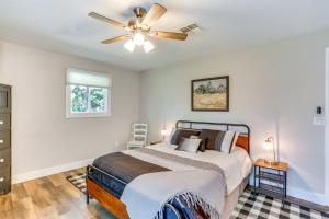 A bed or beds in a room at Quiet Redding Getaway about 7 Mi to Downtown!