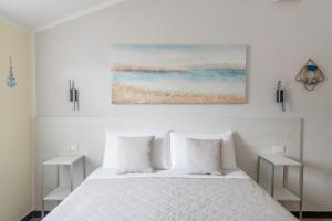 Postel nebo postele na pokoji v ubytování B&B Vignola