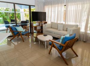 A seating area at Villa Escondinte de Playa