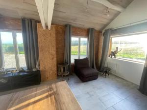 Χώρος καθιστικού στο Maison chaleureuse de campagne