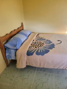 Postel nebo postele na pokoji v ubytování Tim's & Mag's Home Stay