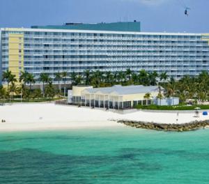 a large hotel with a beach and a large building at The Haven Hideaway & Platinum in Freeport