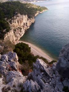 a view of a beach from a cliff at Villa Natasha in Makarska