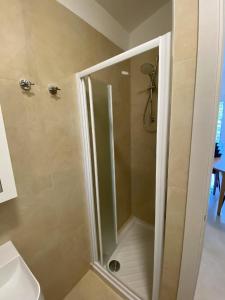 Ванная комната в Ferienhaus für 8 Personen ca 65 qm in Bibione, Adriaküste Italien Bibione und Umgebung