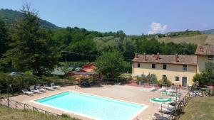วิวสระว่ายน้ำที่ Ferienwohnung für 4 Personen 2 Kinder ca 80 qm in Serravalle Pistoiese, Toskana Provinz Pistoia หรือบริเวณใกล้เคียง