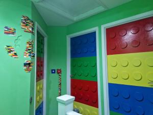 a childs room with a lego wall at The Lego themed house in Windsor
