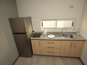 Kuchyň nebo kuchyňský kout v ubytování De Triana Hotel + 31 fotografií