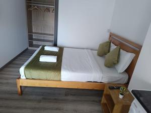Ένα ή περισσότερα κρεβάτια σε δωμάτιο στο LISABONNA GUEST HOUSE