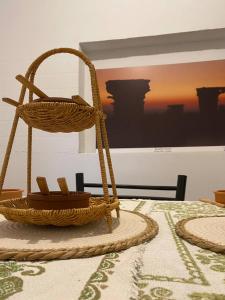 a table with two baskets on top of a table at Seleucia DaR Umm Qais in Um Qeis