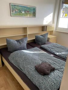 Cama ou camas em um quarto em Ferienhaus "Vogelnest"