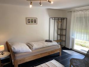 Llit o llits en una habitació de Ferienapartment Dörfles-Esbach