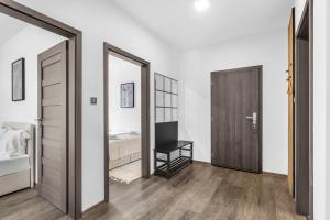 Postel nebo postele na pokoji v ubytování Hotel U Krále Jiřího