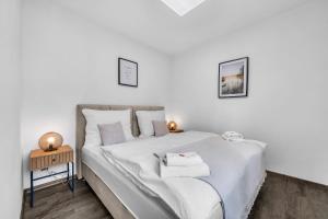 Postel nebo postele na pokoji v ubytování Hotel U Krále Jiřího
