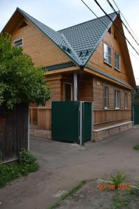 a house with a solar panel on the roof at Cottage in Staraya Russa in Staraya Russa