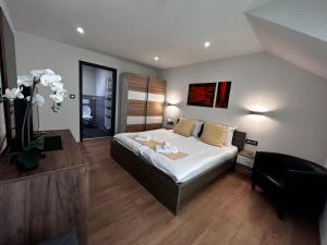 Voodi või voodid majutusasutuse Hotel La Croix Blanche - Bassecourt toas