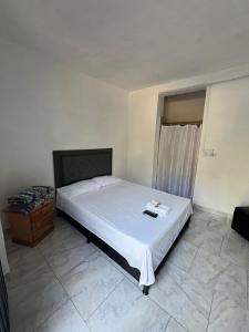 Postel nebo postele na pokoji v ubytování Hosteria Puerta del Nus