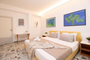 a bedroom with a large bed in a room at [Sea View] Appartamento Panoramico Wifi A/C in Porto San Giorgio